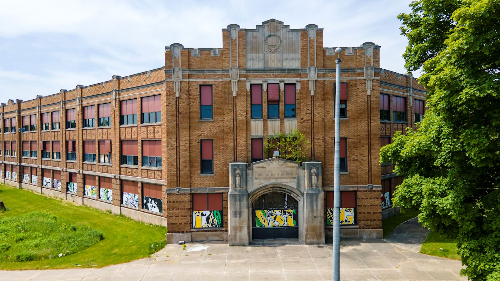Exterior photograph showing front of Walter French School during renovation